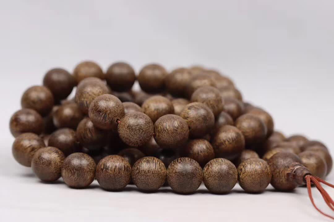 把佛珠一个一个挤出去啊哈二哈佛珠的独特体验，逐一挤出的禅意-第3张图片